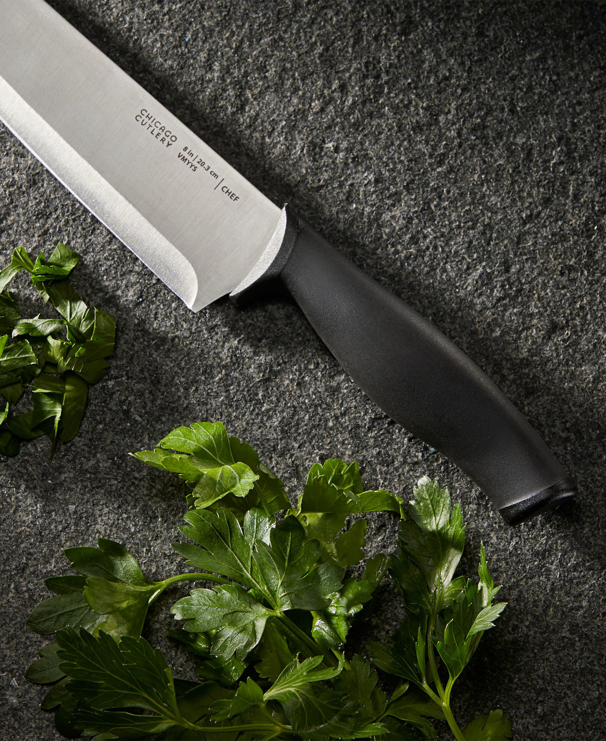 Chicago Cutlery Belmont Chef Knife on counter with parsley