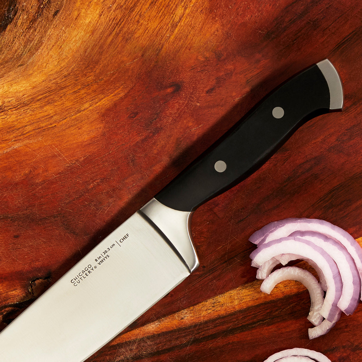 Armitage Chef 8" knife on cutting board with onion