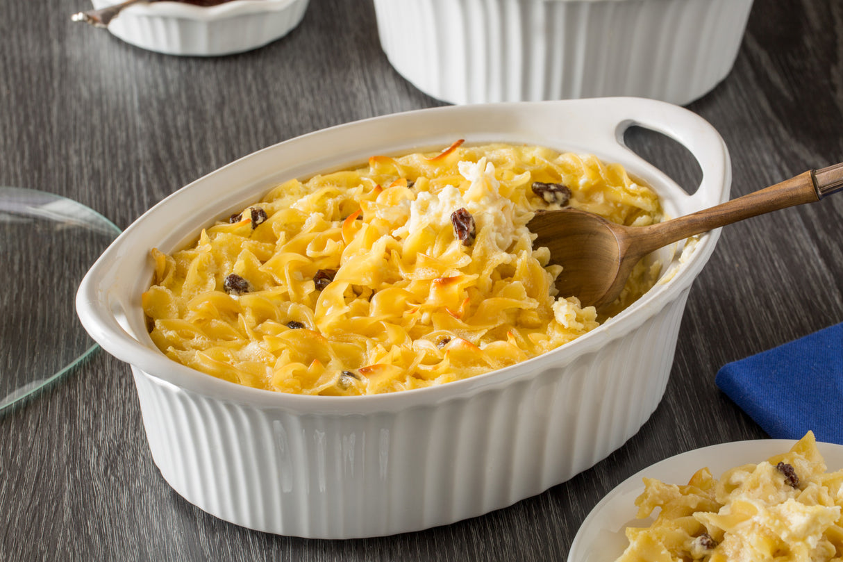 Corningware French White 1.5-qt Oval (with lid) on table with casserole inside