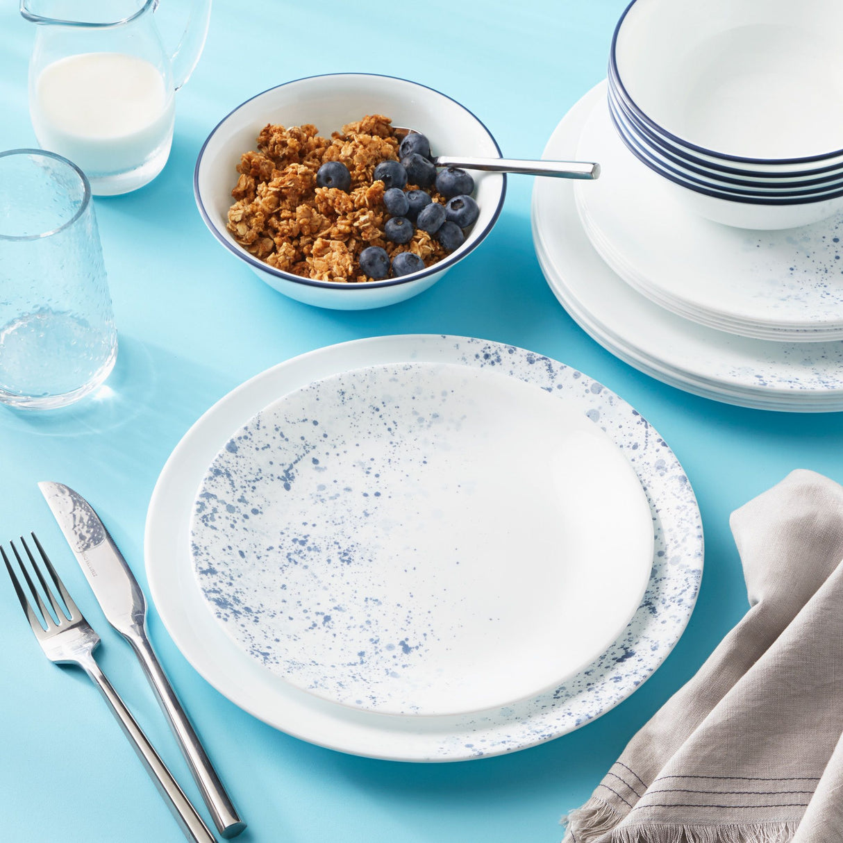 Indigo Speckle dinner, salad plate & cereal bowls on table