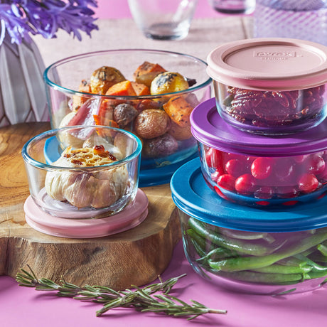  10-piece Glass Food Storage Container Set with food  inside each on the table