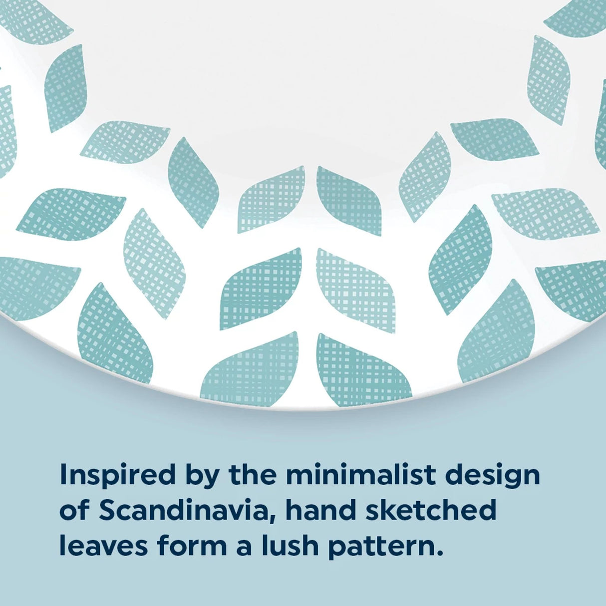 Northern Pines 8.5" Salad Plates on the table with text inspired by the minimalist design of scandiavia hand sketched leaves