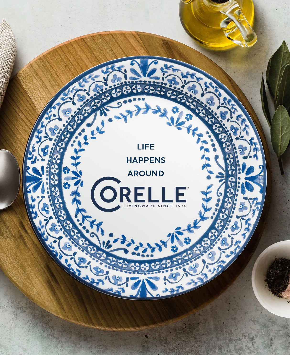 Portofino dinnerplate with text Life Happens Around Corelle