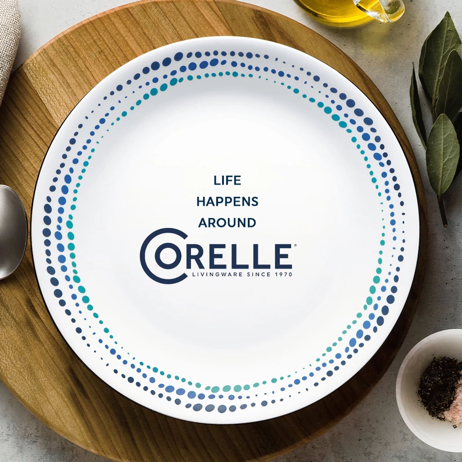 Ocean Blue dinner plate with text life happens around Corelle