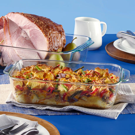  Pyrex Deep Baking Dishes with casserole and ham on table