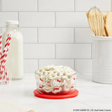 4-cup Glass Storage Hello Kitty® My Favorite Flavor on the counter with white chocolate pretzels nside