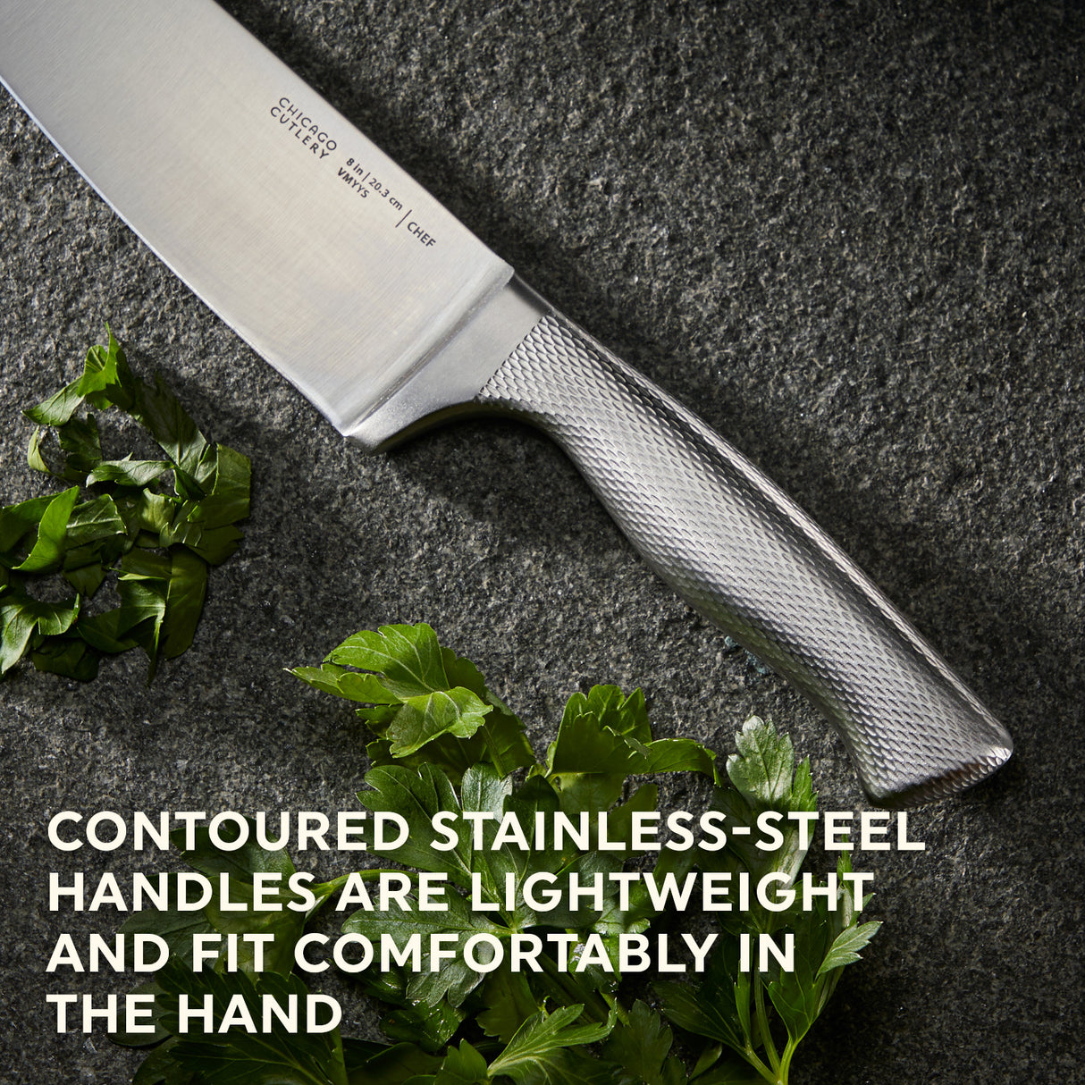 Chicago Cutlery Lasalle Chef Knife on table with parsley and text "contoured stainless steel handles are lightweight and fit comfortably in the hand"