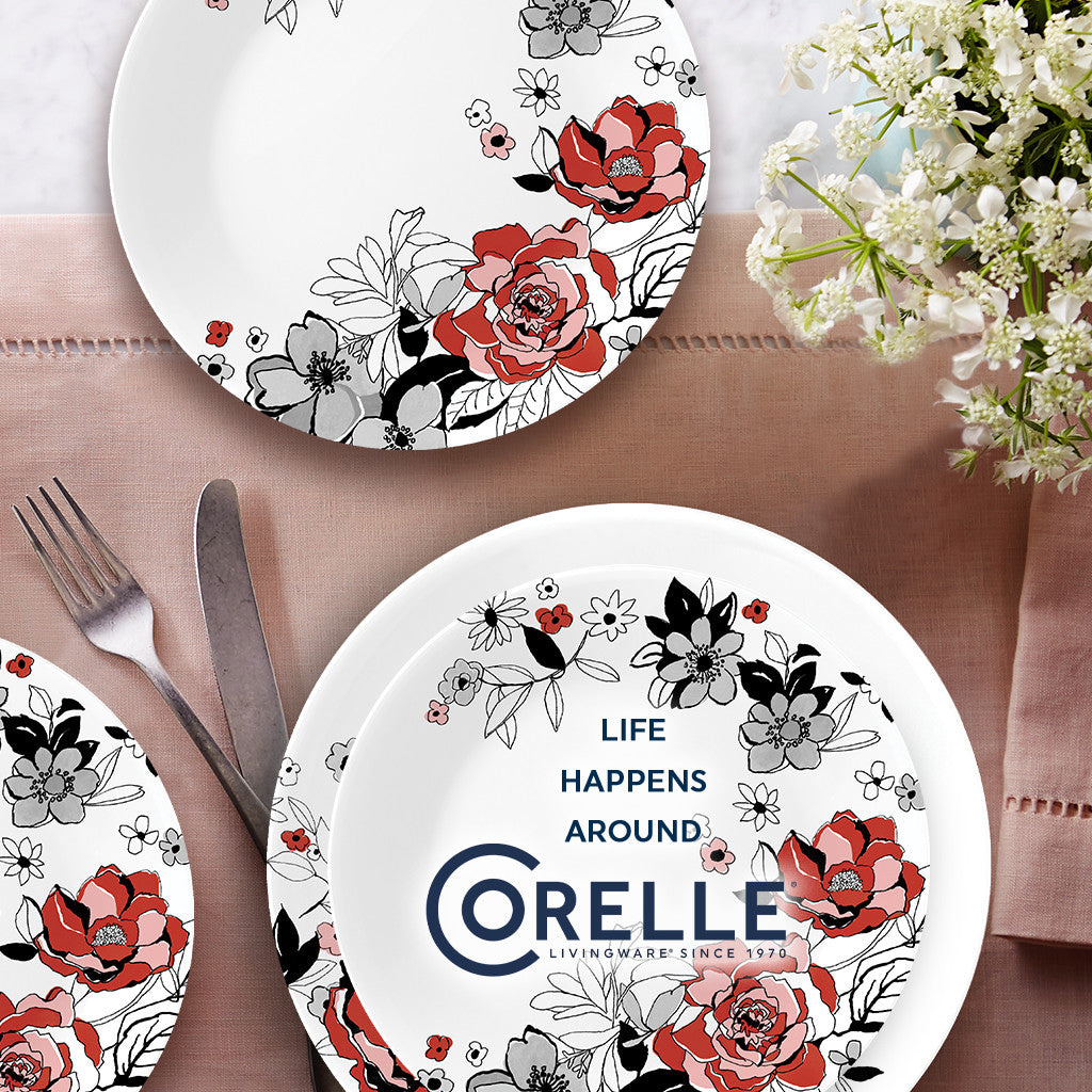 Chelsea Rose Dinnerware on table with text life happens around Corelle Livingware Since 1970