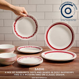 Sadie set with text Corelle #1 dinnerware brand since 1970; Sadie a mix of sunbursts, dots & bands in deep raspberry. This is a modern take on a classic design