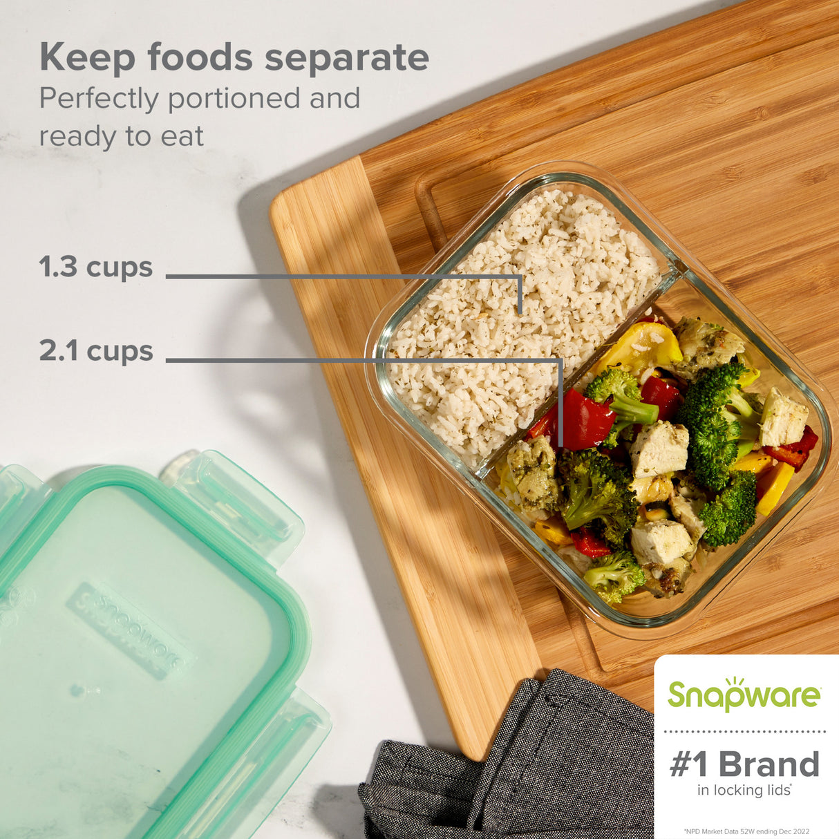 text: Snapware #1 brand in locking lids;  Snapware 4-cup divided meal box; text: keep foods separate perfectly portioned and ready to eat.  small side is 1.3 cups; large side is 2.1 cups