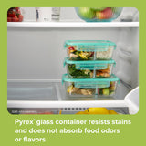 Snapware 4-cup divided dish in fridge with text; Pyrex glass container resists stains & does not absorb food odors or flavors