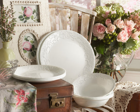  Bella Faenza 18-piece Dinnerware Set in photo with pink roses