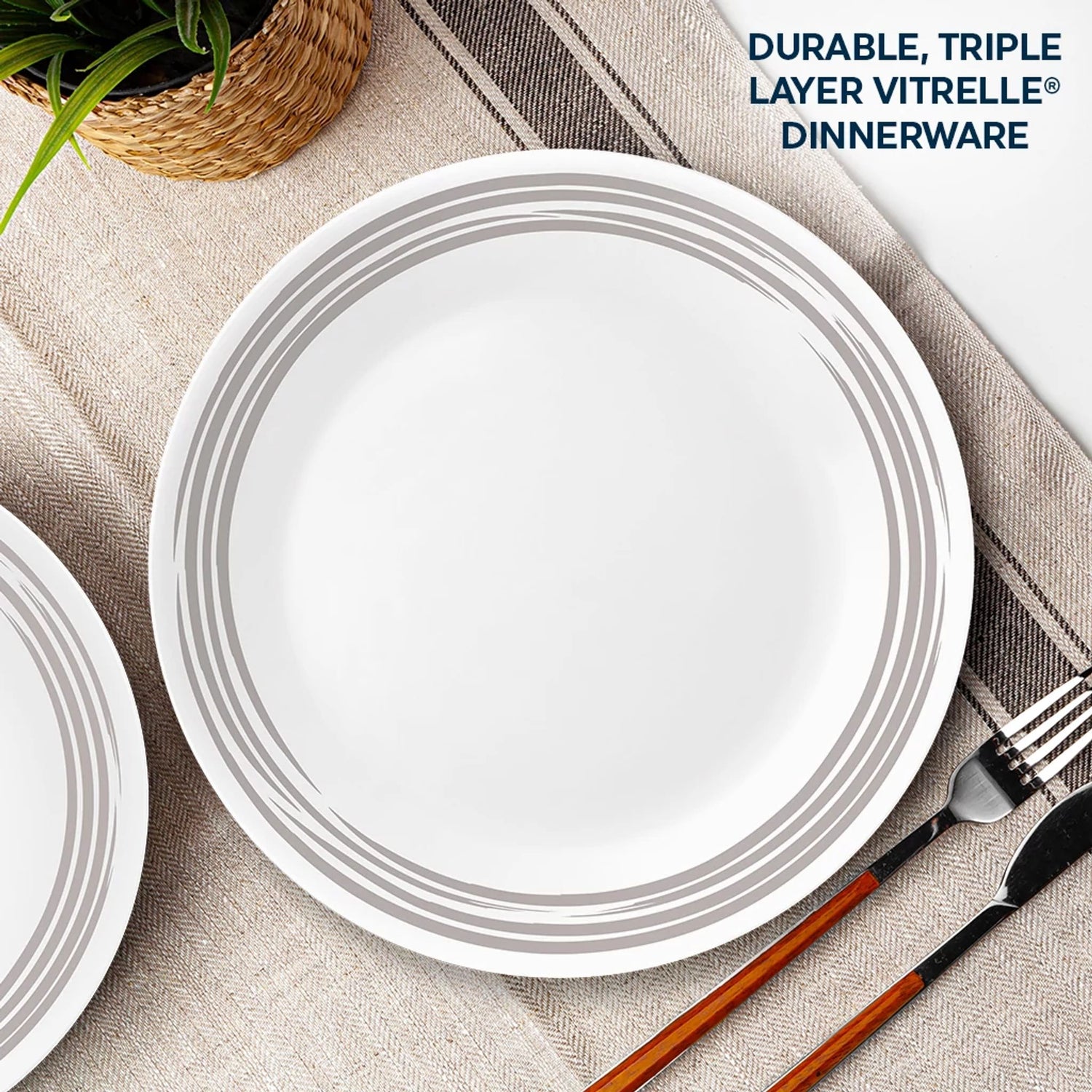  brushed silver salad plate with text that says durable triple layer vitrelle dinnerware
