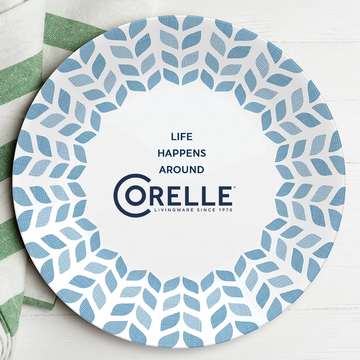  Northern Pines dinnerplate with text that says life happens around Corelle