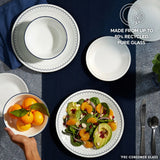  Caspian Lace Dinnerware on tabletop with text made from up to 80% recycled pure glass